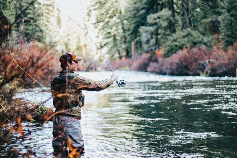 Angler fishing at a peaceful lake