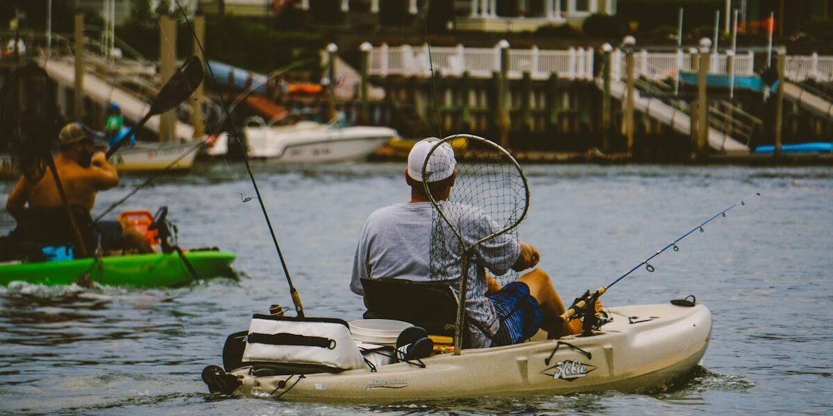 Kayak angler fishing from yellow kayak